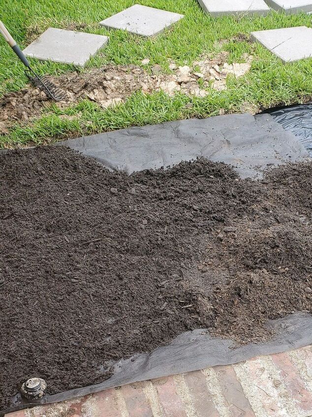 how to make a grill landing pad - add topsoil