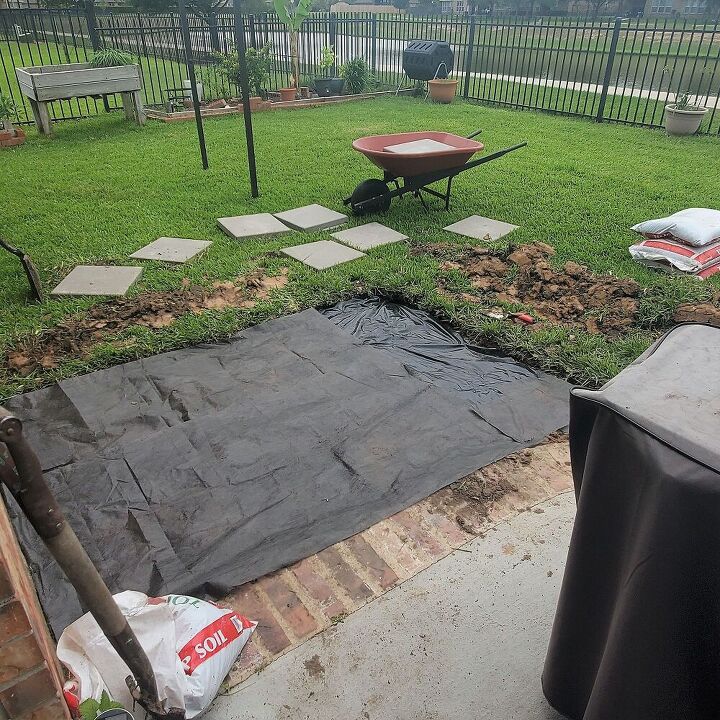 how to make a grill landing pad - lay down a grass/weed barrier.