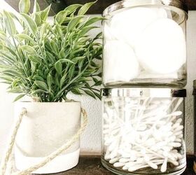 14 ways to get a gorgeous bathroom in only three hours, Use empty candle jars for storage