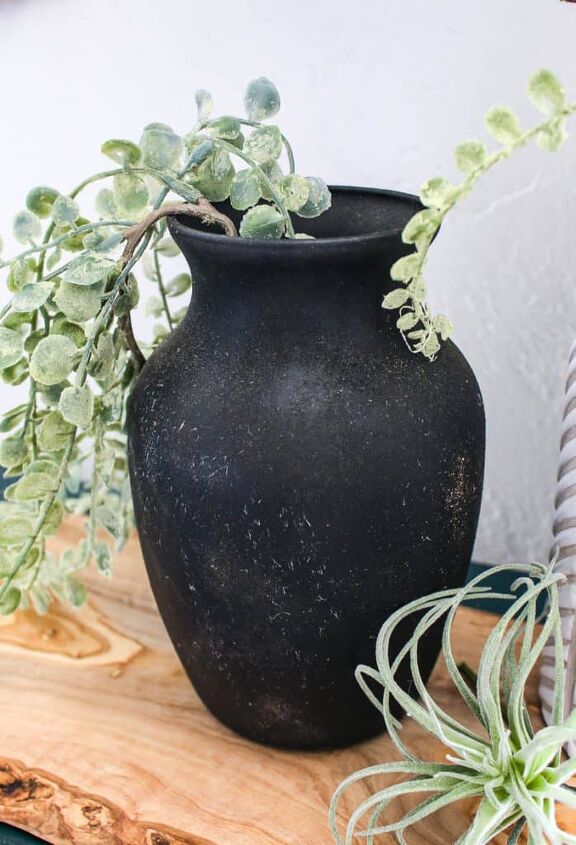 s 11 ways to make vintage decor using items your probably already own, Spray paint any old vase black and then cover with dirt