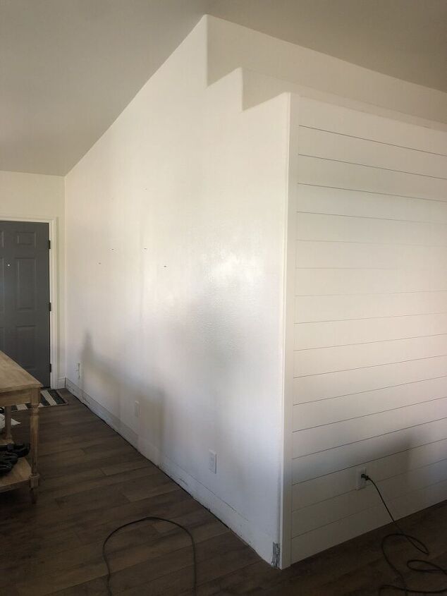 the easy formula to space your board batten wall, flat and shiplap white walls meet at corner