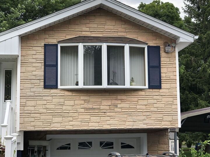 q update fake brick in front of house