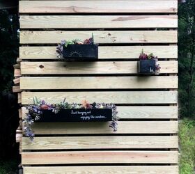 feature outdoor wood wall with diy planter boxes
