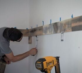 installing a reclaimed wood accent wall in my workshop