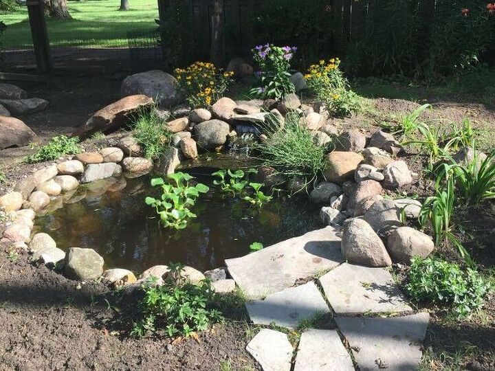 q how do i place large boulders around pond