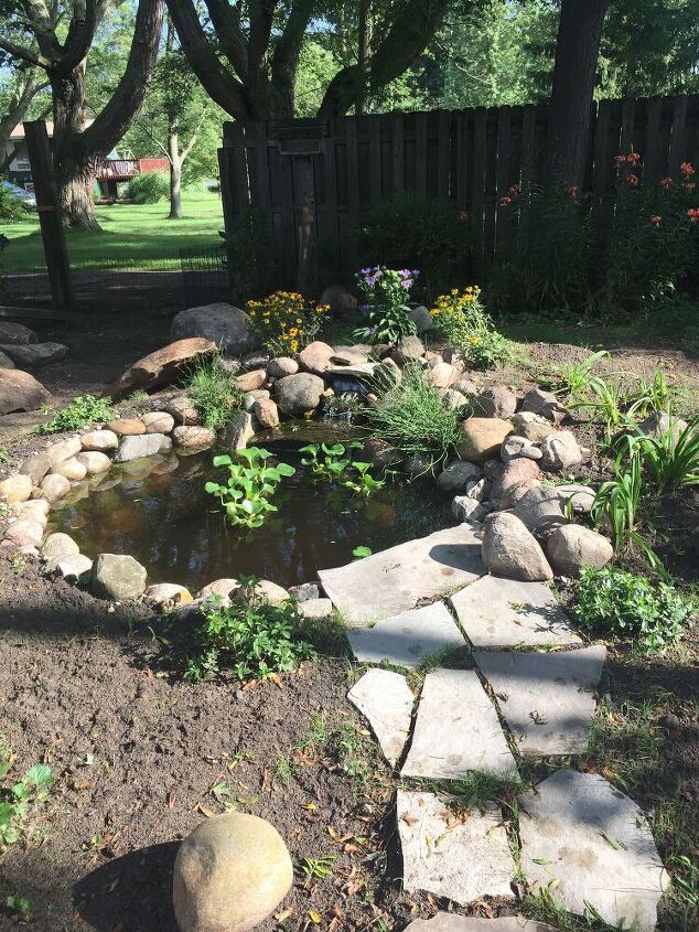 q how do i place large boulders around pond