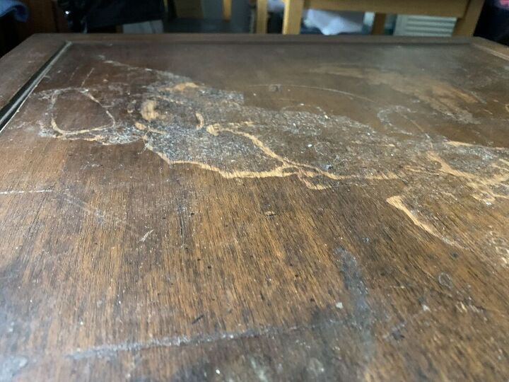 q how do i repair what i think is lifting veneer 50 yr end table