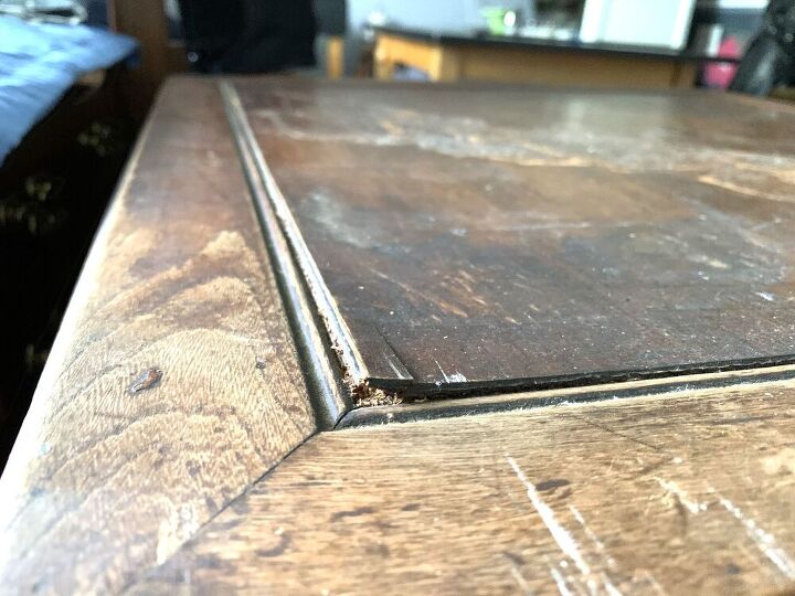 q how do i repair what i think is lifting veneer 50 yr end table