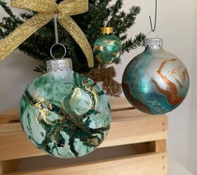 s 12 creative christmas ornaments you can make on a budget, Check out these Hydro Dip Ornaments