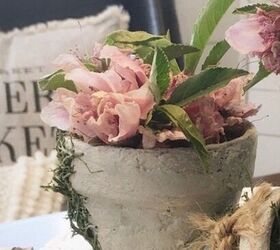 joint compound flower pot makeover, Adding the faux flowers and embellishments