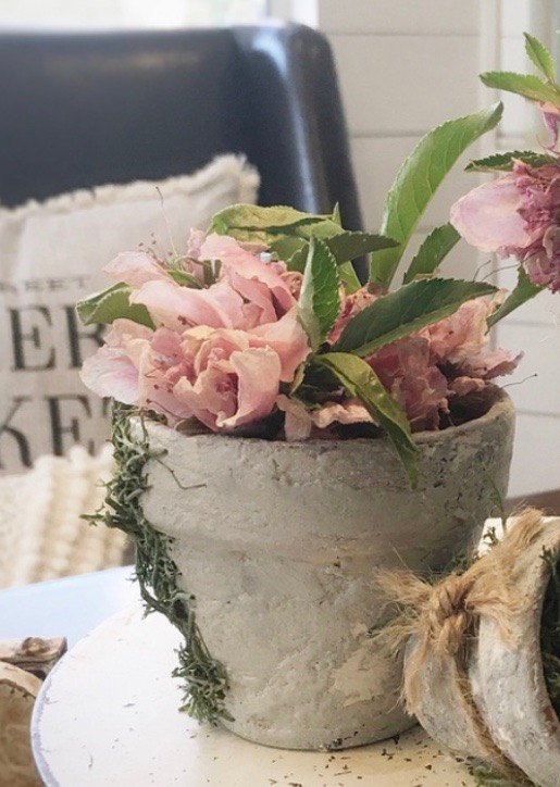 joint compound flower pot makeover, Adding the faux flowers and embellishments