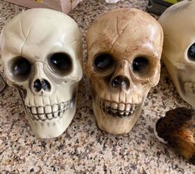 Using cheap plastic skulls, look what they make for their porch