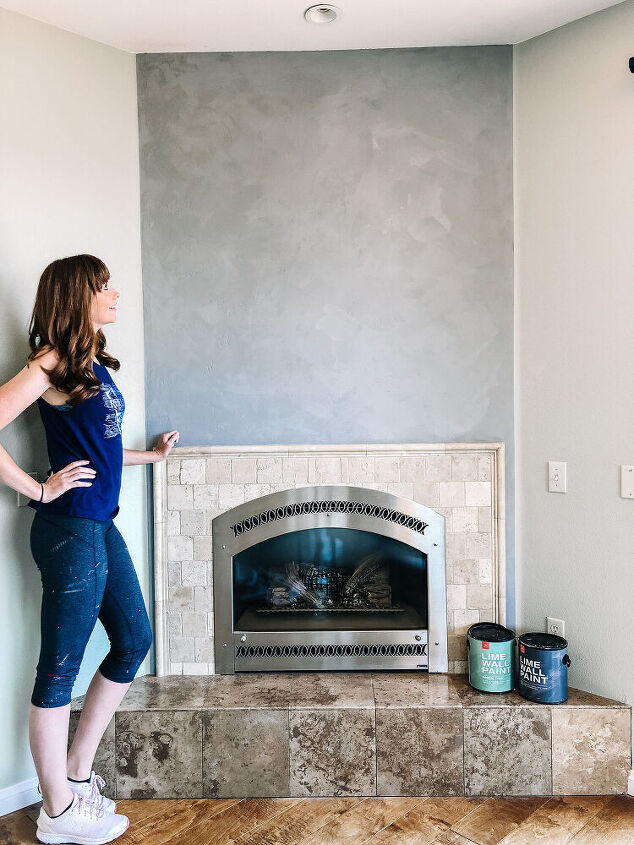 fireplace wall makeover with concrete textured finish