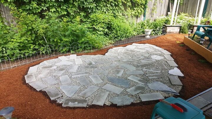 i repurposed bricks to make a patio