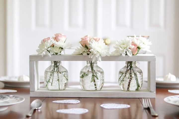 32 charming farmhouse decor ideas you can diy for 30 or less, Farmhouse Wood Framed Flower Vase Centerpiece