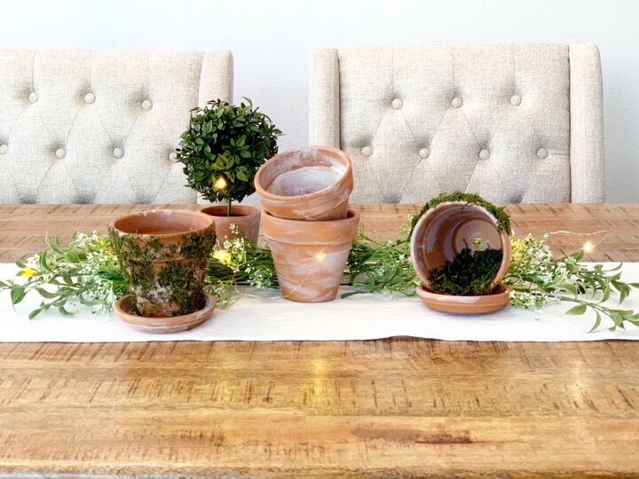 32 charming farmhouse decor ideas you can diy for 30 or less, Terra cotta Pot Centerpiece