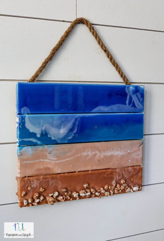 20 gorgeous ideas that ll get you hooked on resin and paint pouring, Epoxy Pour Ocean Art on Pallet Wood