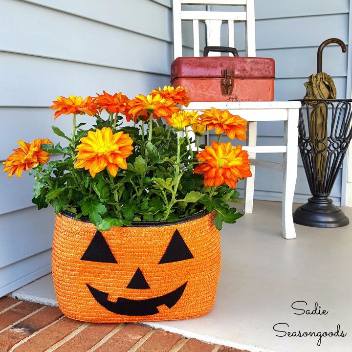 s 20 fall friendly ways to decorate your home with flowers, Straw Tote Bag Halloween Jack o Lantern Planter