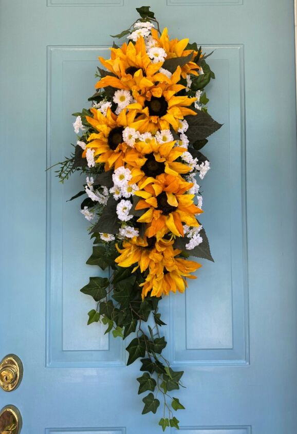 s 20 fall friendly ways to decorate your home with flowers, Make a Sunflower Swag