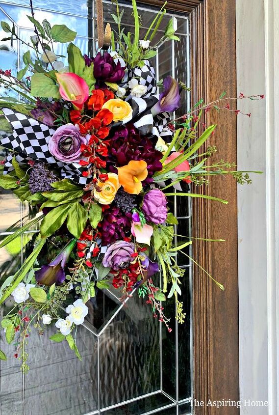 s 20 fall friendly ways to decorate your home with flowers, Make This Halloween Door Swag DIY In a Day