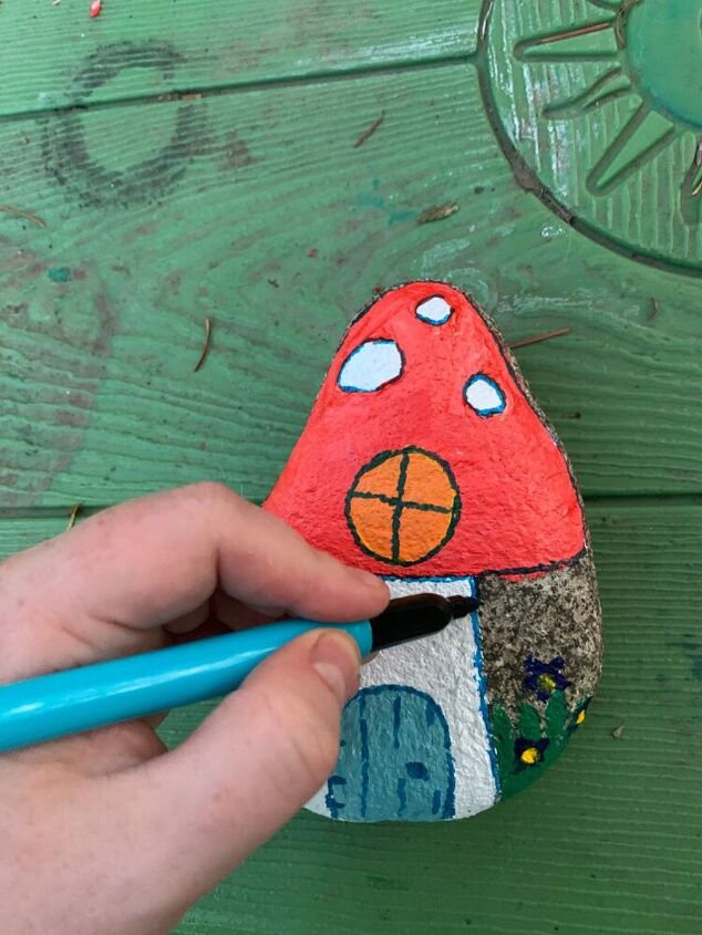 casa de hadas de roca pintada