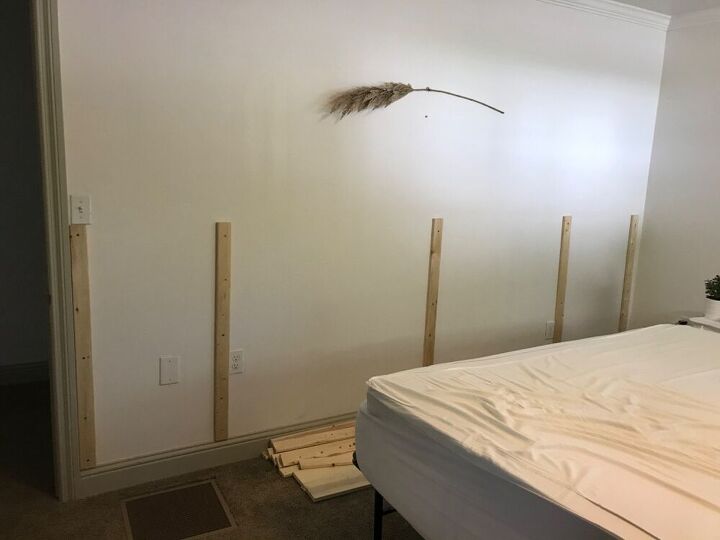 minimalist scandinavian wood slat headboard with floating nightstands