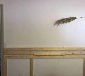 minimalist scandinavian wood slat headboard with floating nightstands