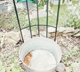 They drill holes in a large bucket to give their yard a quick improvement