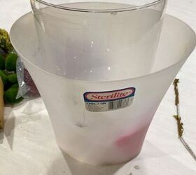 Put a cloche in a trash bin for this beautiful fall decor creation