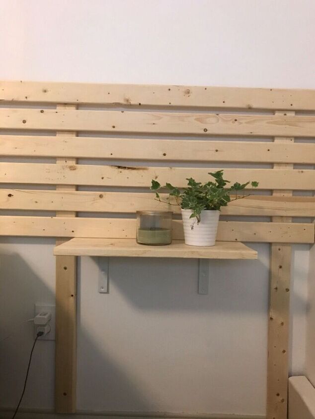 minimalist scandinavian wood slat headboard with floating nightstands