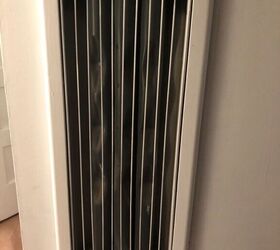 decorative metal cover for old working natural gas wall room heater