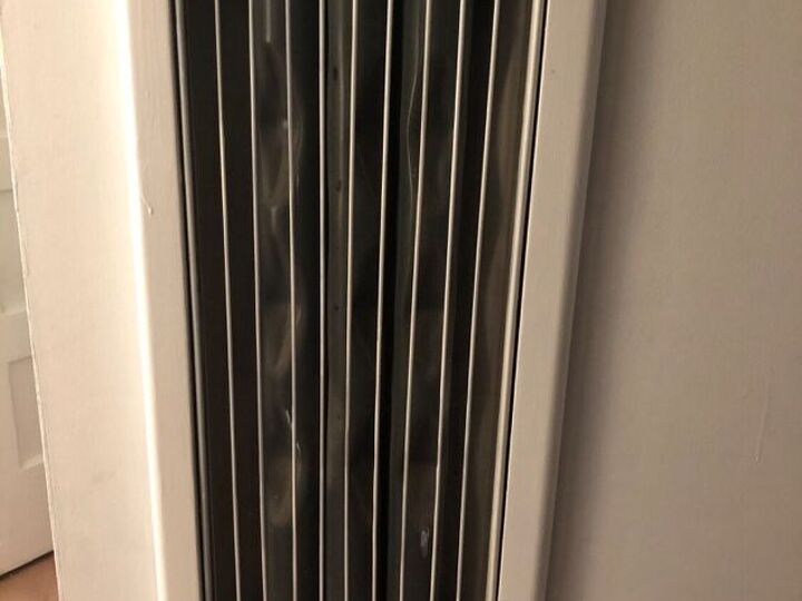 q decorative metal cover for old working natural gas wall room heater