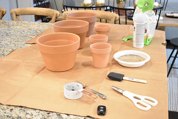 how to age terra cotta pots