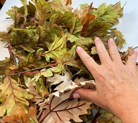 Turn a pile of fake leaves into a romantic front door accent