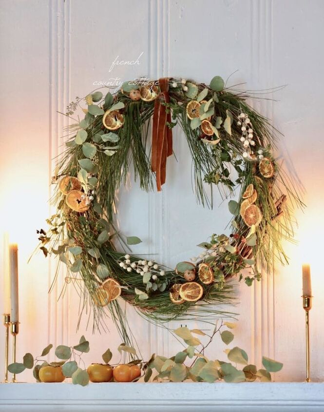 s 16 stunning fall wreaths that you can make for 30 or less, DIY Orange Slice Fresh Greens Wreath