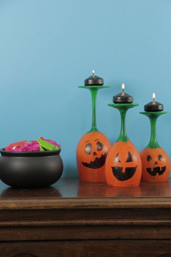 s 32 genius pumpkin ideas to try this fall, Jack O lantern Candle Holders for 2