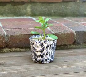 transform a plastic plant pot into a durable planter