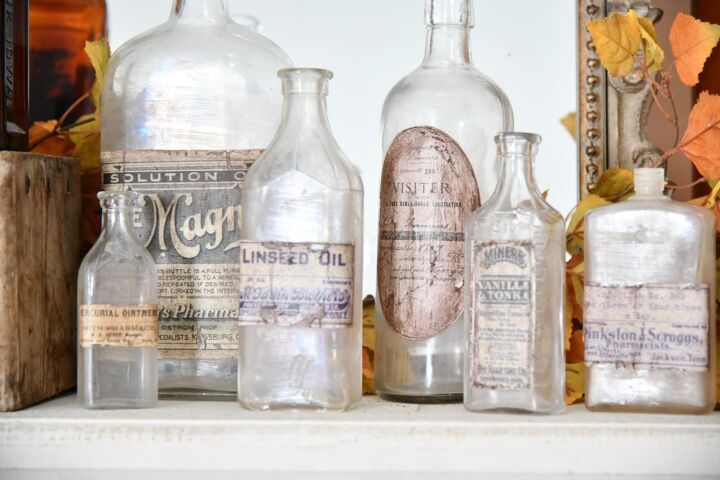 s 13 ways to decorate for fall using items you probably already own, Vintage Apothecary Bottles