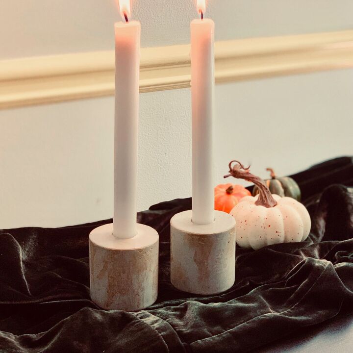 s 13 ways to decorate for fall using items you probably already own, Concrete Candlestick Holders