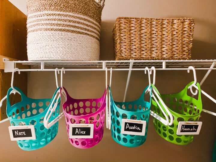 31 ideas that ll keep your home organized and looking good, Use S Hooks and a Leaning Towel Rack to Sort Laundry