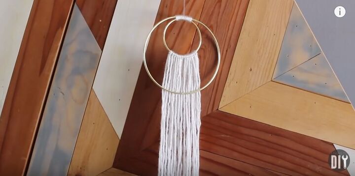 11 hula hoop decor ideas we never would ve thought of, DIY Boho Wall Hanging