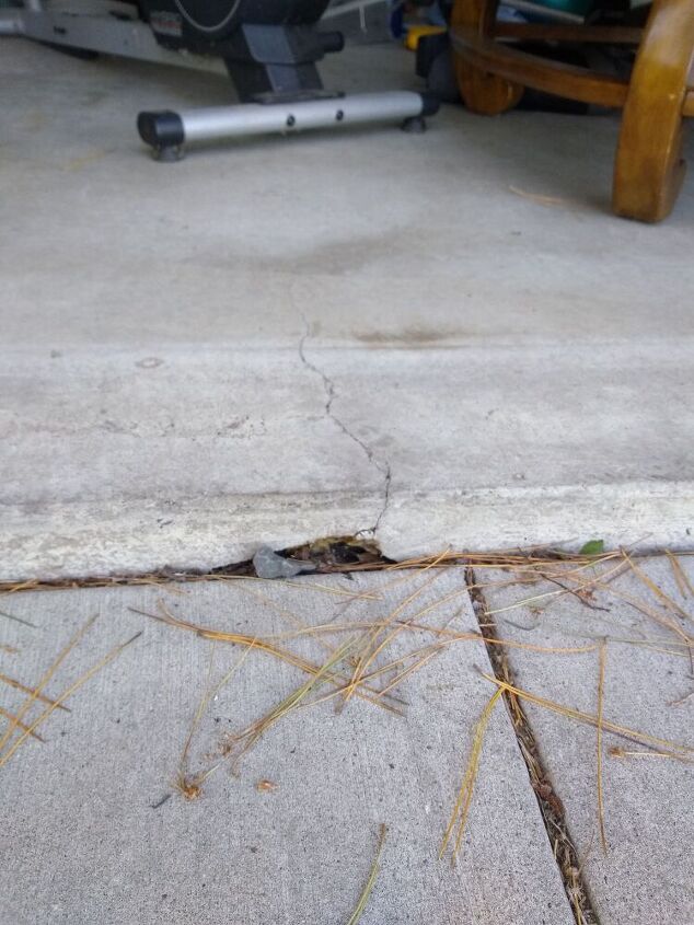 q how should i handle gap and erosion of garage slab