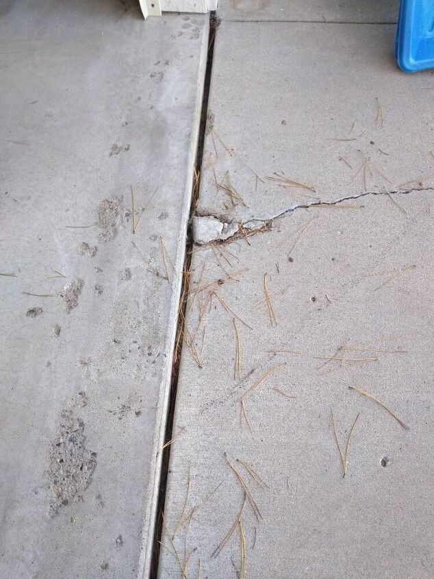 q how should i handle gap and erosion of garage slab