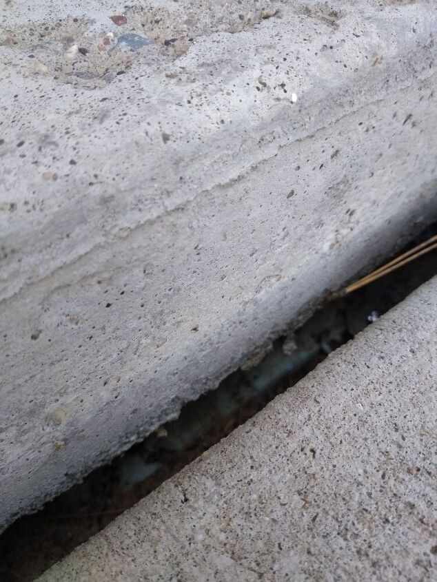 q how should i handle gap and erosion of garage slab