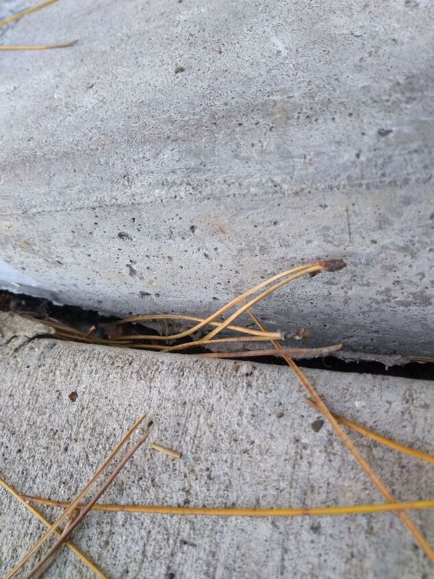 q how should i handle gap and erosion of garage slab