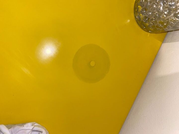 q how do i remove candle stain from wood