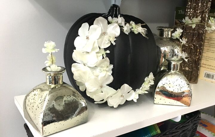 s 12 spooky halloween ideas everyone s copying this year, Floral Moon Pumpkin