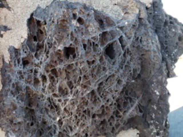 q how to repair leaking chimney made of porous stone