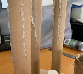 Drip hot glue down cardboard tubes to get this eerie look