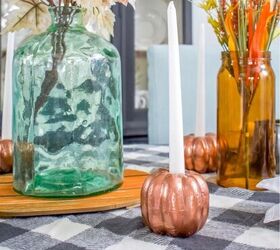 s 20 ways to sprinkle autumn colors throughout your home, Turn cheap foam pumpkins into seasonal candlestick holders